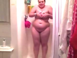 Chubby chick getting naked in the shower